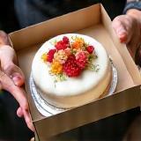 Cake box being handed over.
